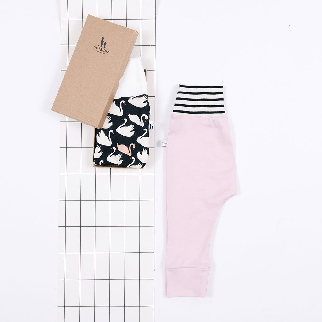 flat lay of baby pants gift set 