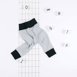 flat lay of classic grey organic baby pants