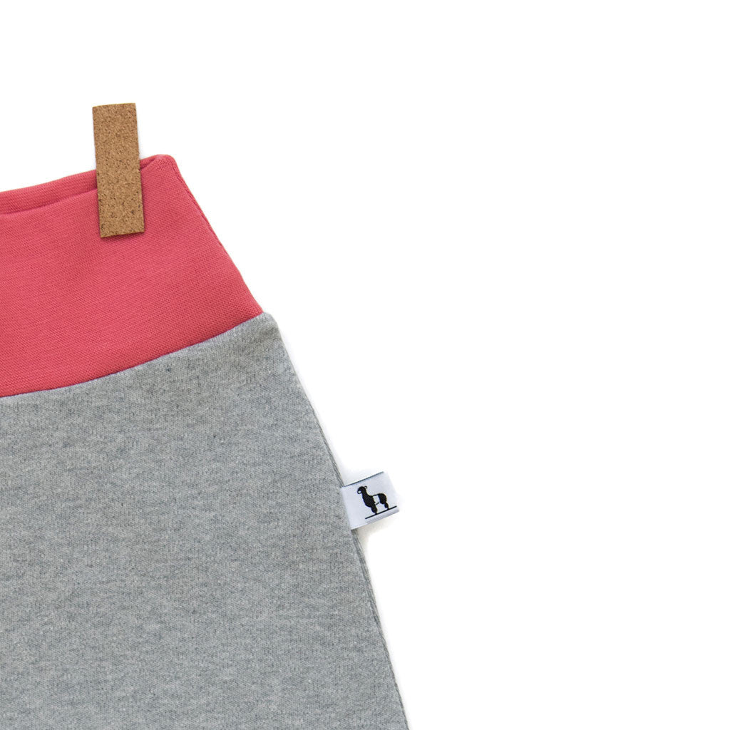 close-up of grey and pink baby pants 