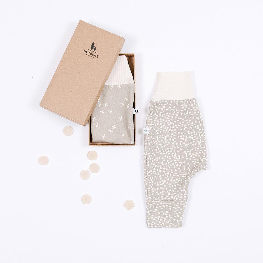 flat lay of sandbox baby pants gift set 