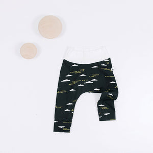 flat lay of black baby pants with cloud prints